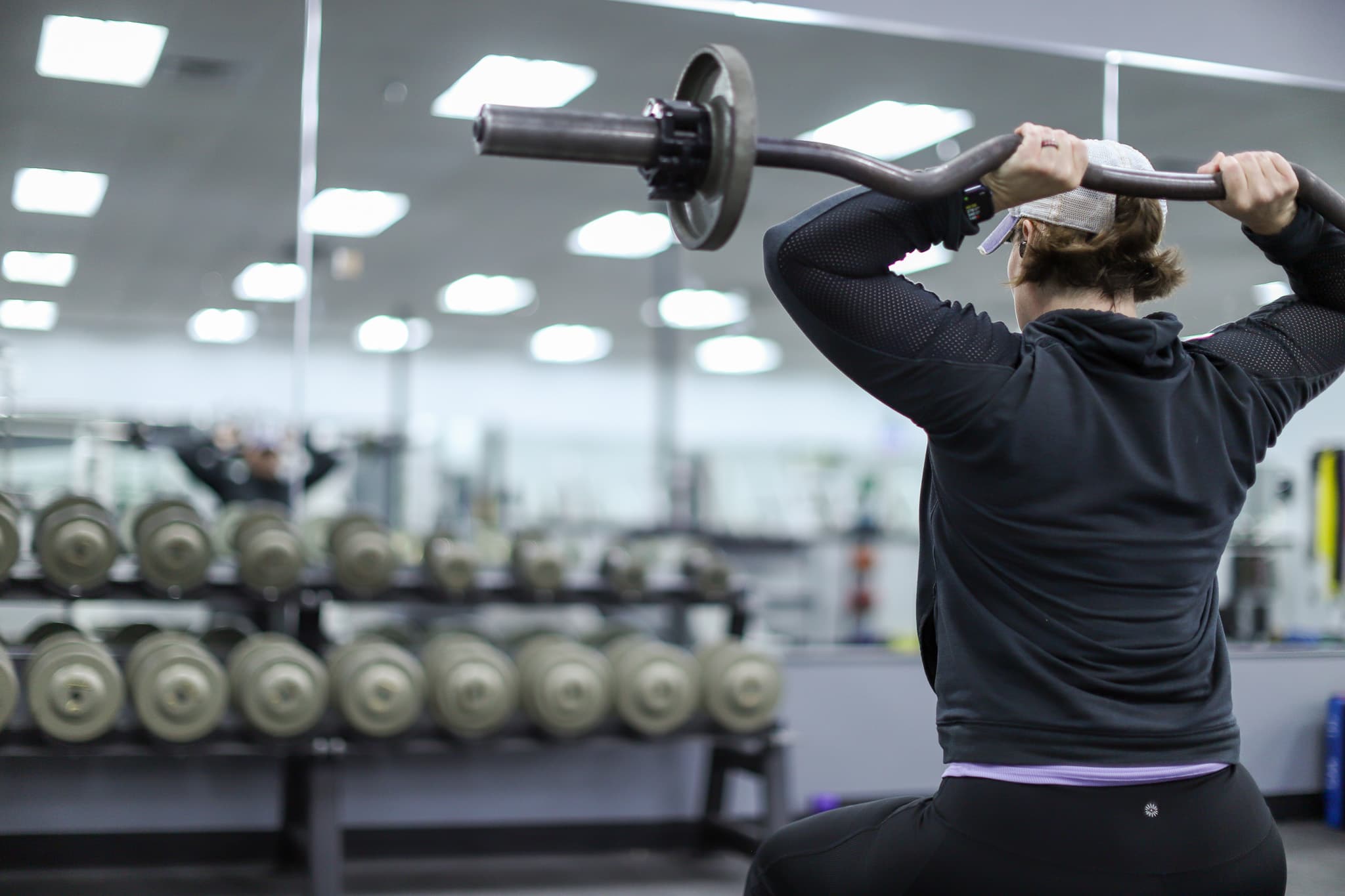 Member strength training inside Legends Gym